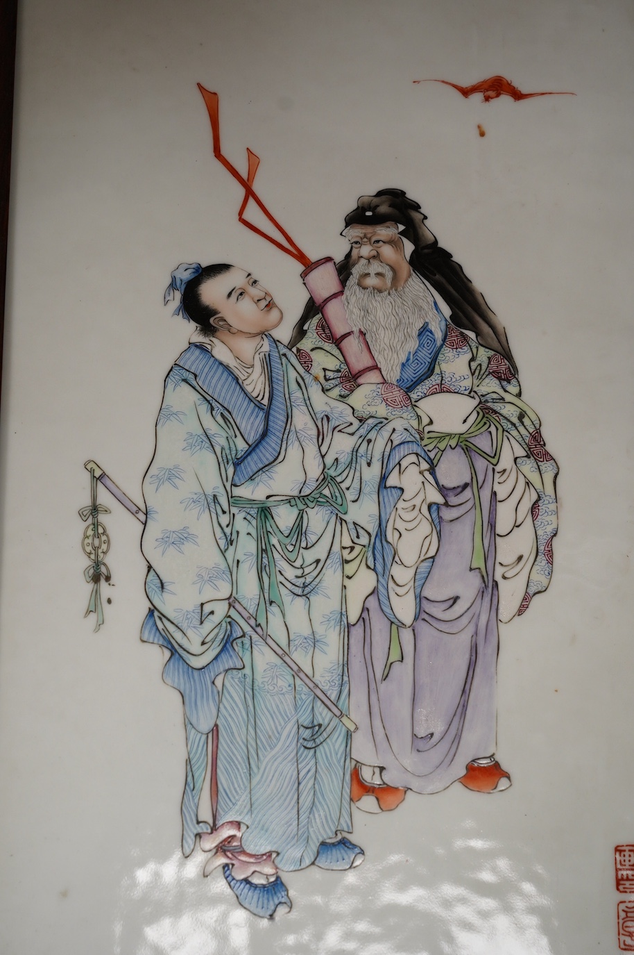 A Chinese famille rose plaque of the immortals Lu Dongbin and Zhang Guo, Republic period